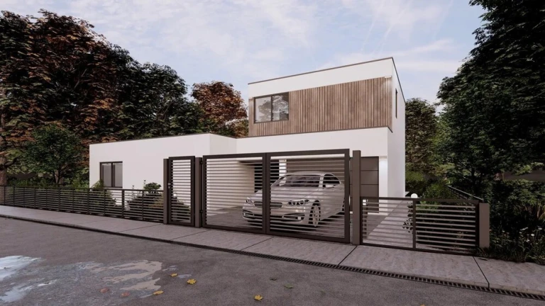 A modern single-family home with a black horizontal slatted fence and a gate, in front of which stands a silver car.